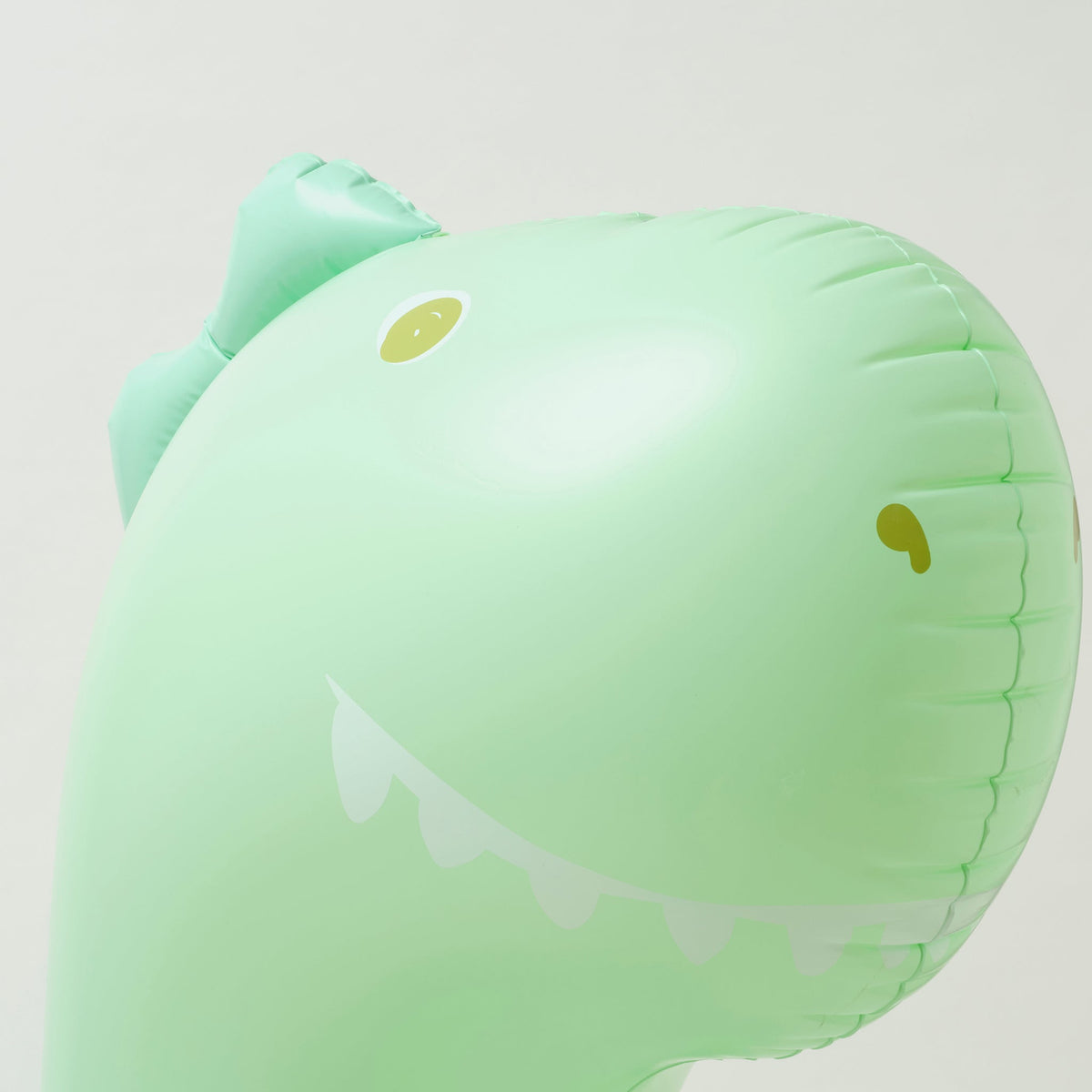 SUNNYLIFE Inflatable Giant Sprinkler Surfing Dino