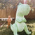 SUNNYLIFE Inflatable Giant Sprinkler Surfing Dino