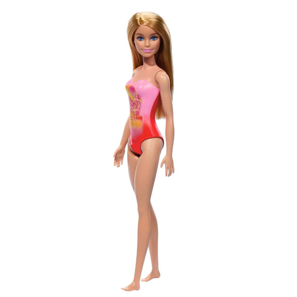 Beach Barbie Doll With Blond Hair Wearing Pink Swim Suit