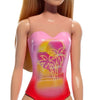 Beach Barbie Doll With Blond Hair Wearing Pink Swim Suit
