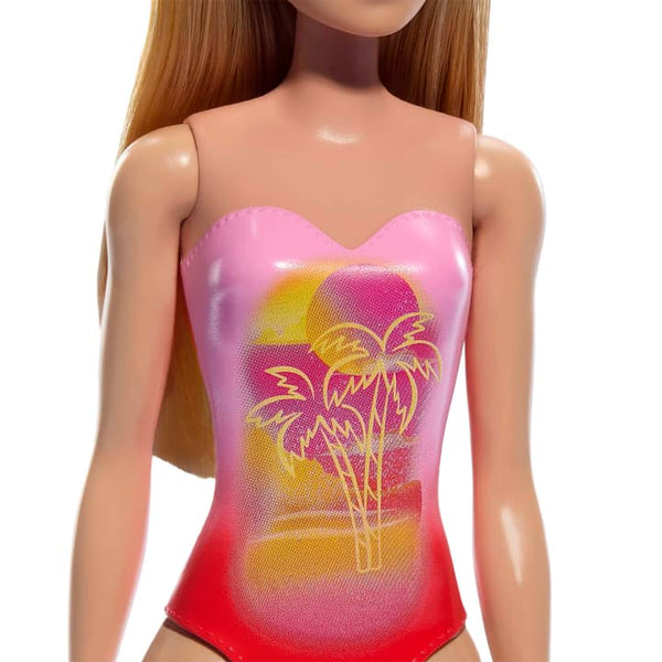 Beach Barbie Doll With Blond Hair Wearing Pink Swim Suit